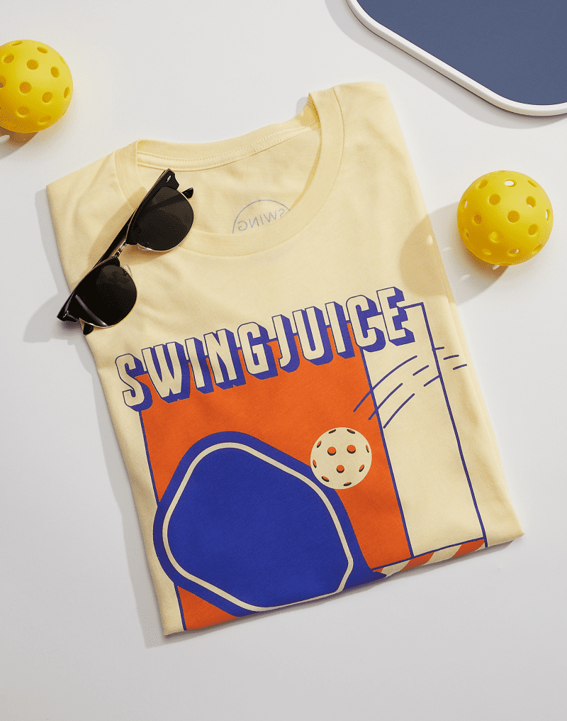 04 swingjuice dink smash win repeat unisex tee pale yellow